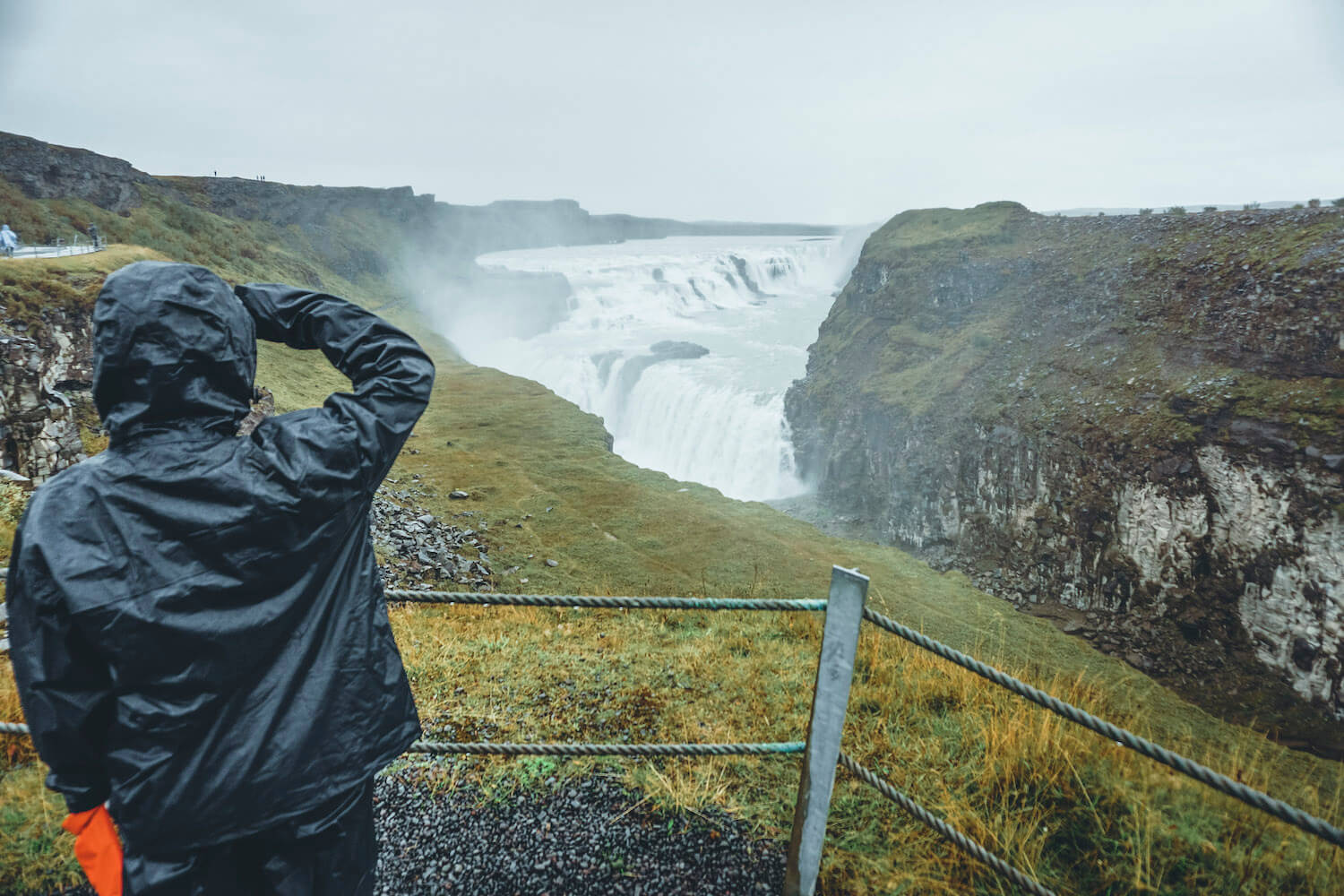 Picture Of Jeannie Standing at Gullfoss Waterfall Along The Ring Road