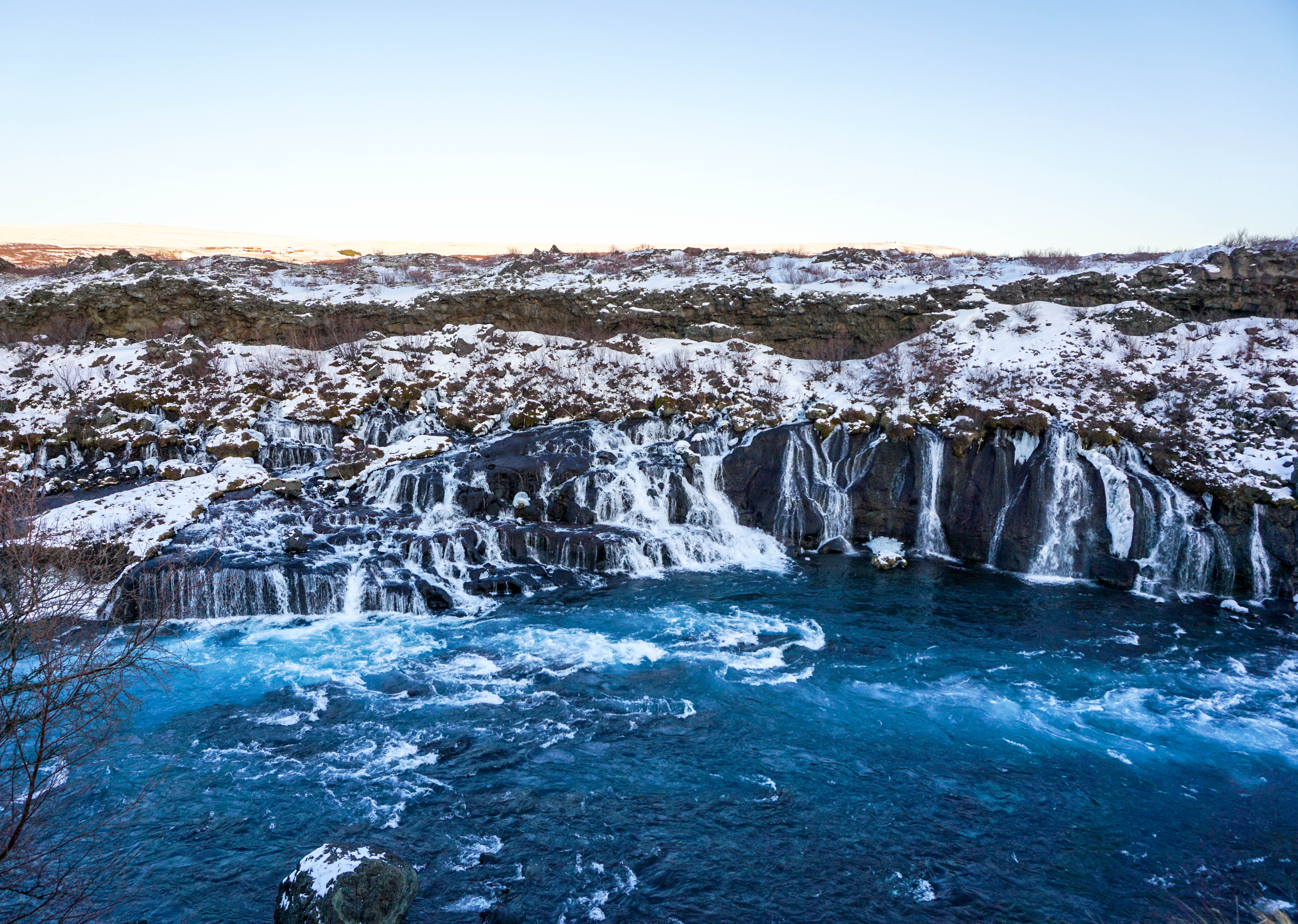 Looking for some Hidden Gems in Iceland? Get off the beaten path by visiting Hraunfossar & Barnafoss waterfalls, a quick day trip from Reykjavik! | Life With a View