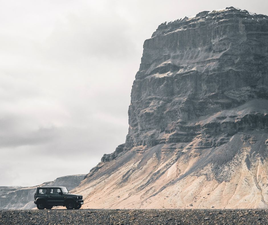 Picture of Jeannie Parked Next to a Big Tall Rock Mountain in South Iceland