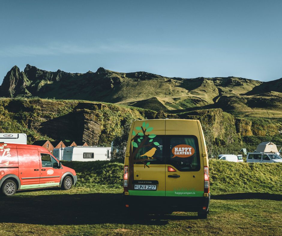 Picture of the Happy Campers Campervans parked in a Campground  | Iceland with a View 