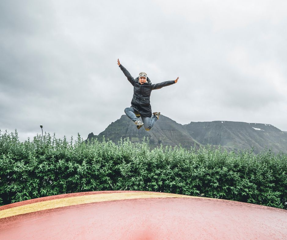 Picture of Jeannie Jumping on a Bouncing Mat | Iceland with a View