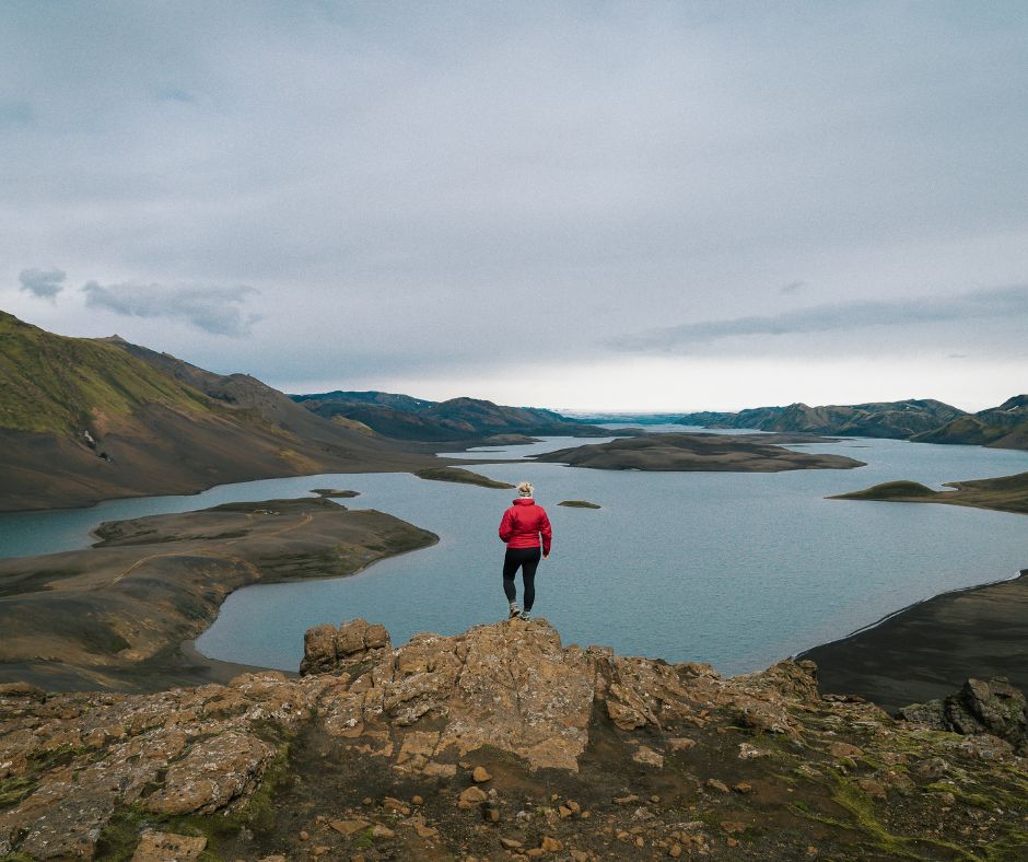 Picture of Jeannie Wearing Rain Gear for Iceland on Top of the Langisjor Highlands | Iceland with a View