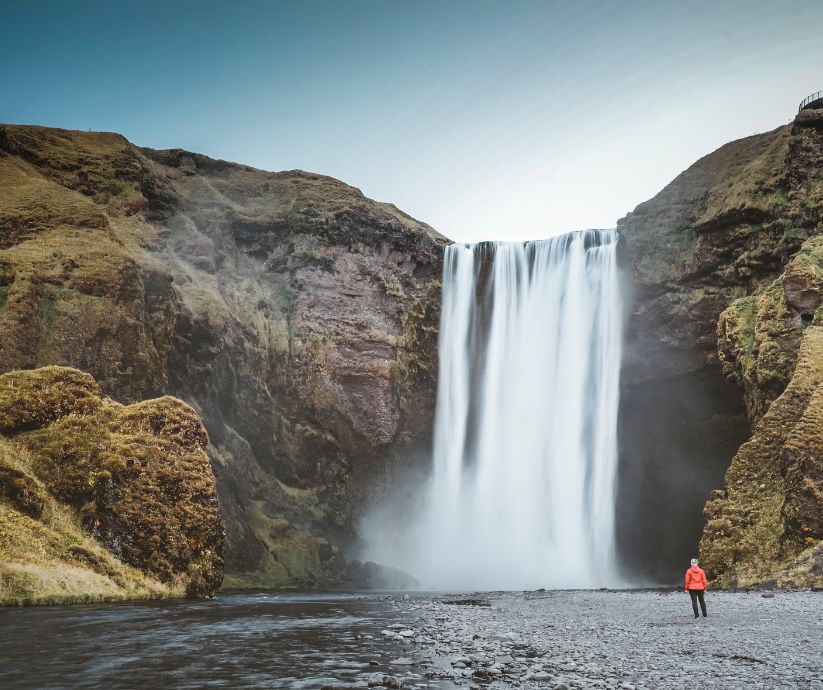 Image of Jeannie seeing the waterfall of Skógafoss | South Coast Iceland | Iceland with a View 
