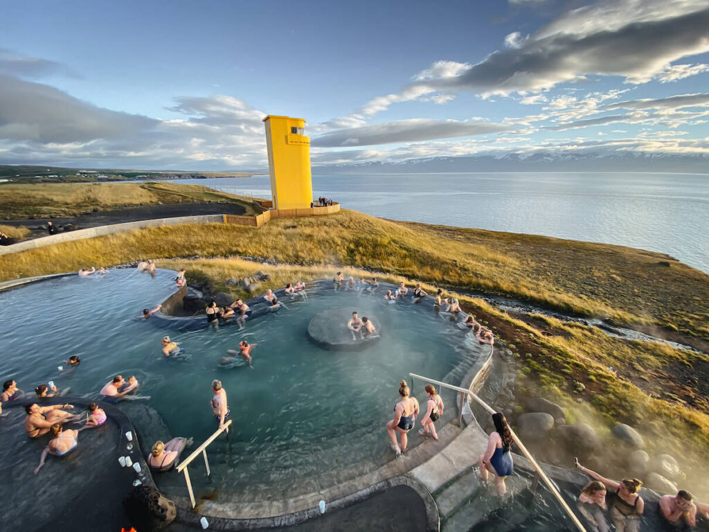 People at Geosea Husavik Hot Spring in Iceland in August