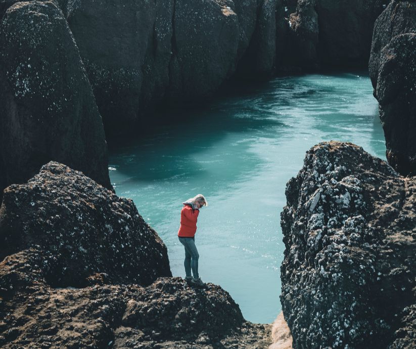 Picture of Jeannie on the Edge of a Rock in Bruarfoss | Iceland with a View