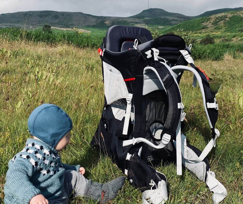 Jeannie's Kid Sitting Beside the Backpack Carrier | Iceland with a View 