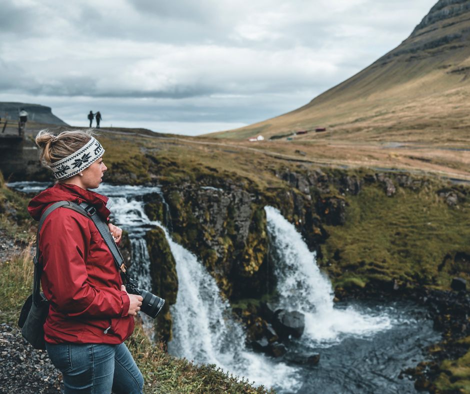 Picture of Jeannie watching a waterfall in Iceland | Iceland in September 