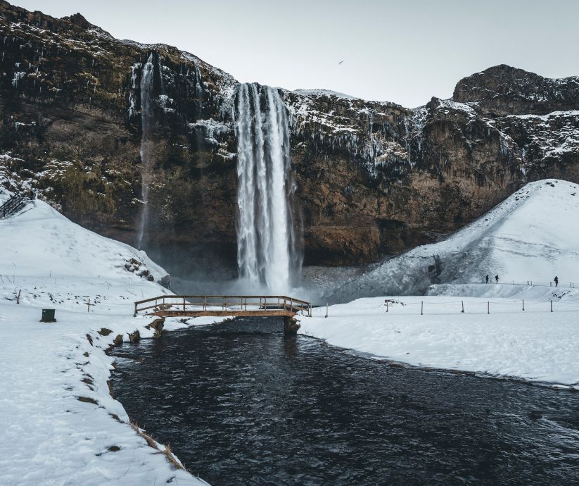 Landscape View of Seljalandsfoss in Covered in Snow in Iceland in November | Iceland with a View 