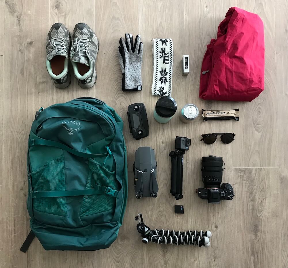 Picture of Gear You Need for Hiking on Glymur Waterfall that Includes Waterproof Shoes, Gloves, Sunglasses, Snacks, Headband, Hiking Boots and Pants, etc. | Glymur Waterfall | Iceland with a View 