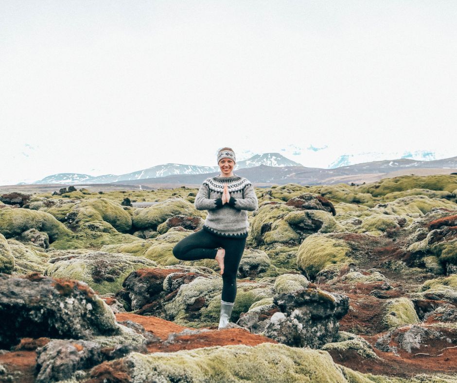 Picture of Jeannie Doing a Yoga Pose in a Mountain while Wearing an Icelandic Lopapeysa (Traditional Icelandic Sweater) | Icelandic Lopapeysa | Iceland with a View