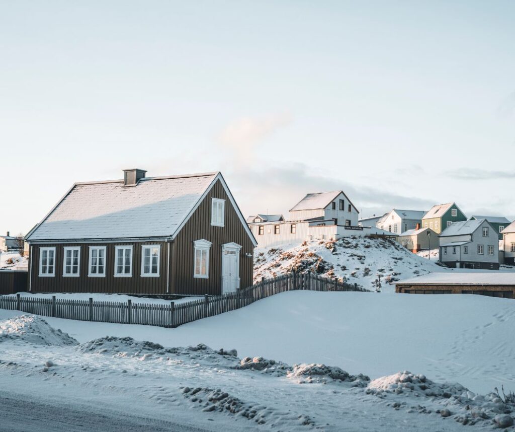 Picture of Houses in Iceland covered in Snow during Winter In Iceland | Iceland with a View 