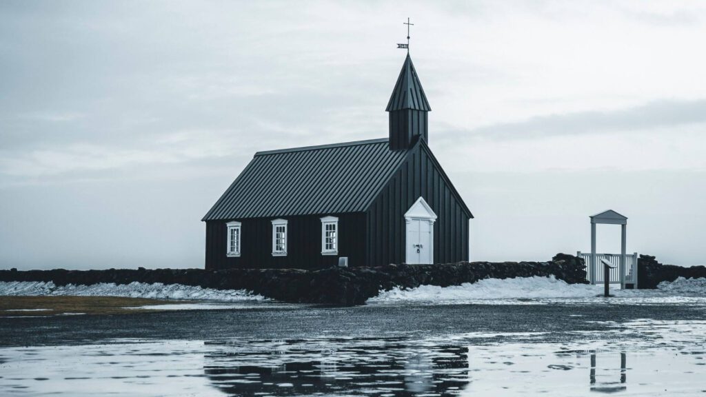 Picture of the black church, Búðakirkja in Búðir, an Iconic part of the Snæfellsnes Peninsula | Iceland with a View 