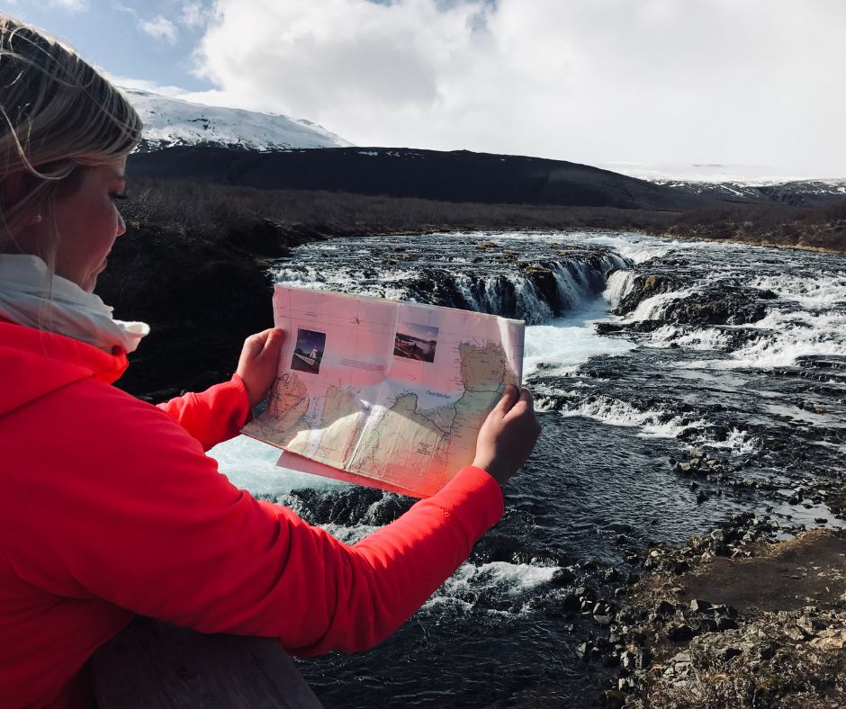 Picture of Jeannie Using the Bruarfoss Hiking Map for Her Trip | Iceland With a View 