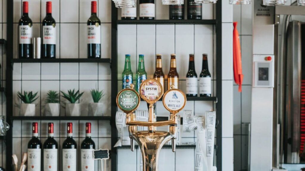 Picture of a Bar Showcasing the Variety of Alcohol Products like Wine and Einstok Beer | Cost of Living Iceland | Iceland with a View  