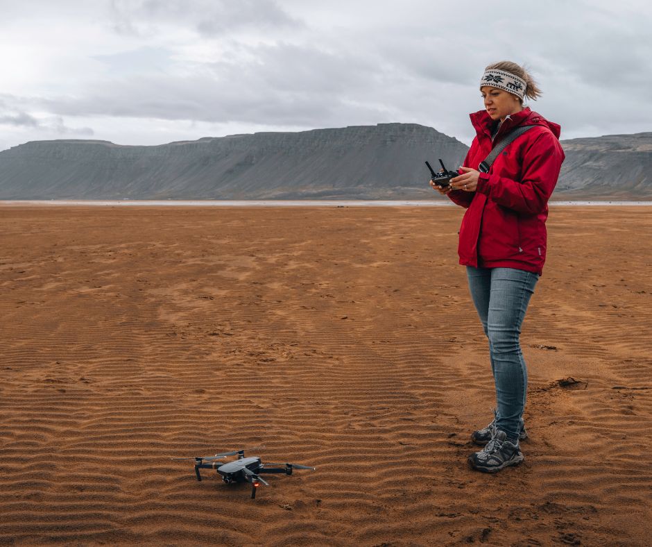 Picture of Jeannie Using Her Drone in the Westfjords to Take Photography in Iceland | Iceland with a View 