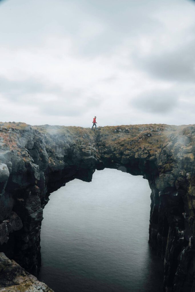 Landscape View of Jeannie in the Middle of the Snaefellsnes Rock Arch | Best Iceland Travel Guide | Iceland with a View