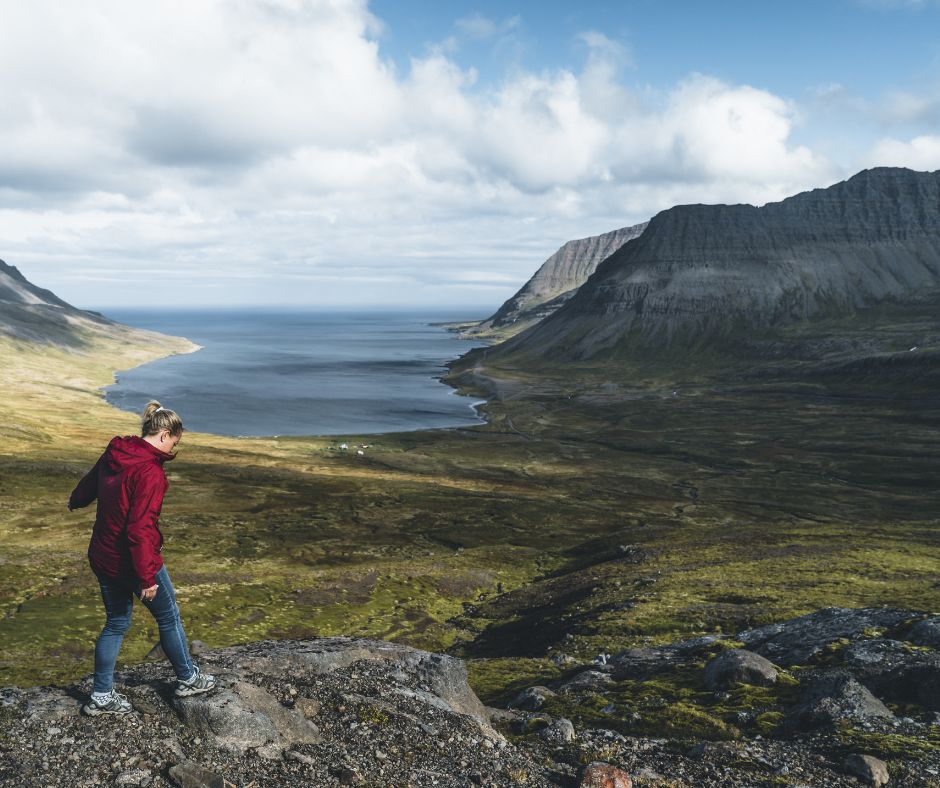 Picture of Jeannie Walking and Looking at the Westfjords View | Solo Travel Iceland | Iceland with a View 