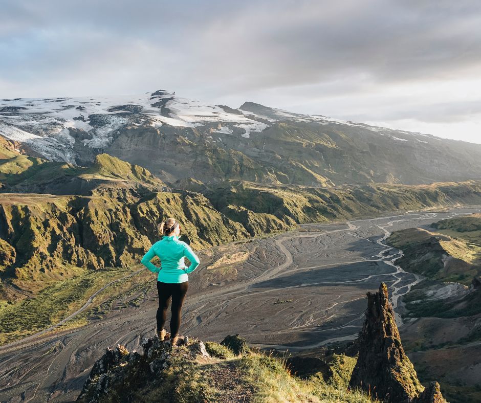 Picture of Jeannie Wearing Layers While Admiring the Valahnjukur Hike in Thorsmork | Iceland with a View