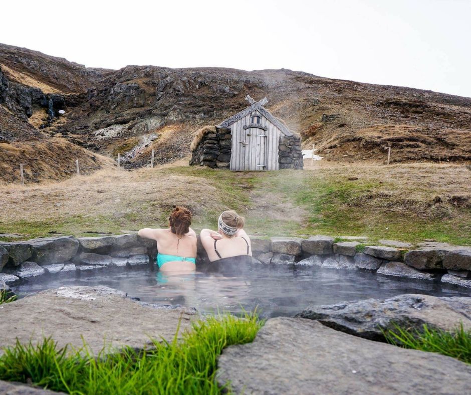 Picture of Jeannie and Friend inside the Guðrúnarlaug Free Hot Spring in Iceland | Iceland with a View 