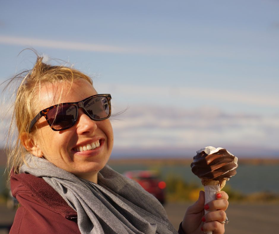 Picture of Jeannie Eating Ice Cream and Wearing Sunglasses in the Summer | Iceland Summer Packing List | Iceland with a View 