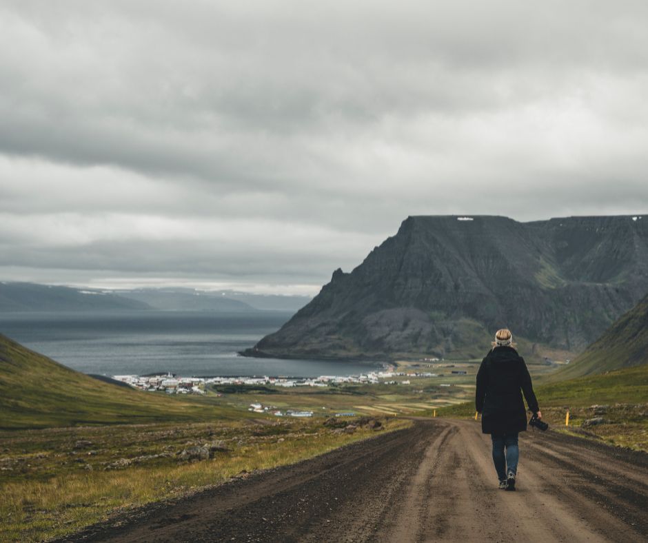 Picture of Jeannie Walking on the Bolungarvík Road in Westfjörds, Iceland | Iceland with a View