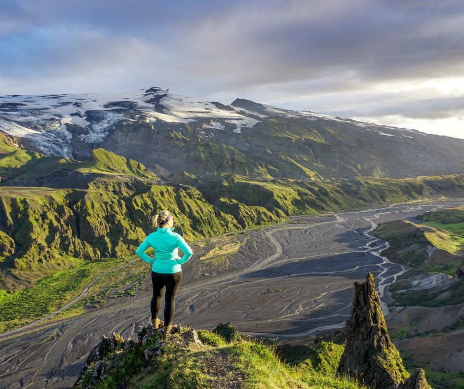 Picture of Jeannie Riley Wearing Layers and Admiring the View from Thorsmork in Iceland | Iceland with a View 