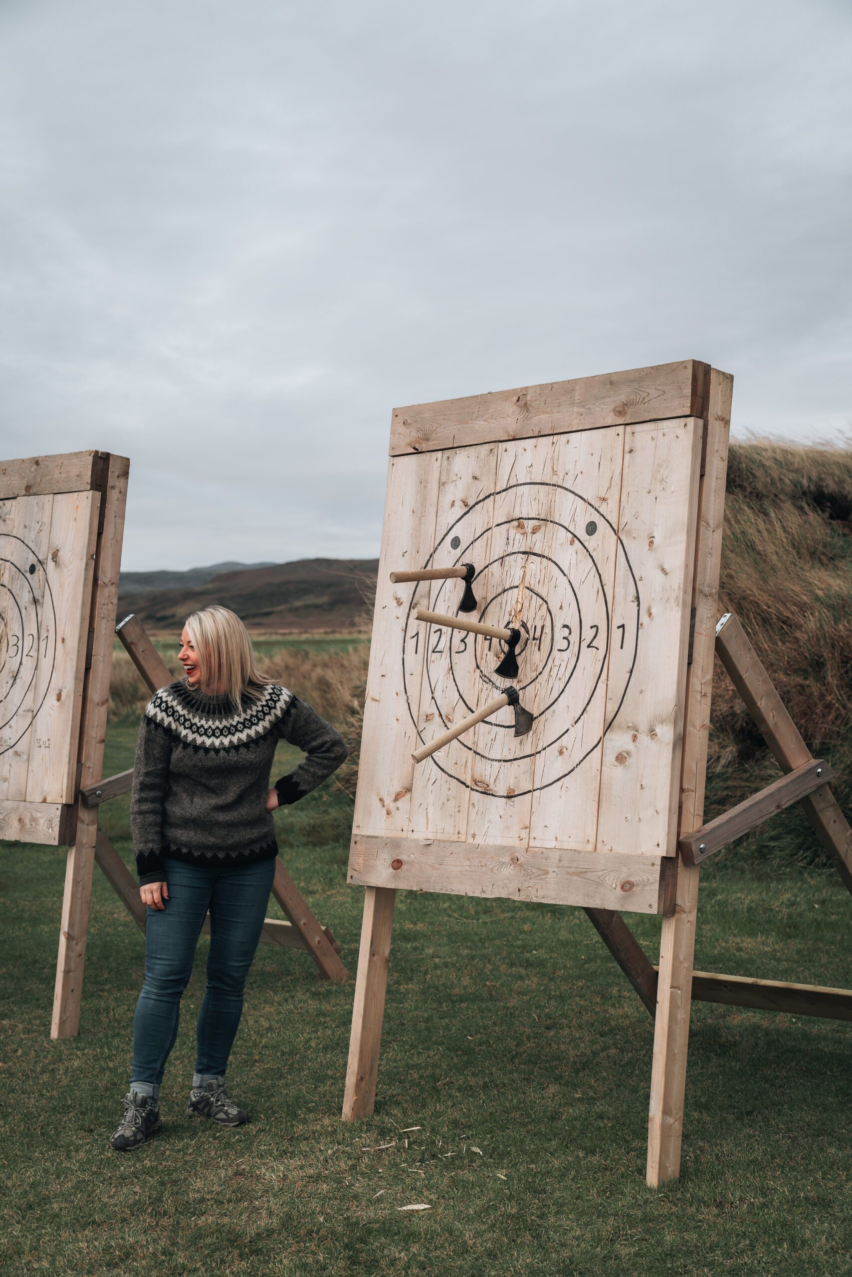 Picture of Jeannie Doing axe throwing, One of the Fun Activities in the Ingólfsskáli Viking Restaurant | Iceland with a View