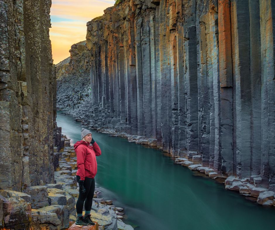 Picture of Jeannie in the Stuðlagil Canyon, a Hidden Gem You can See When Visiting Seydisfjordur in Iceland | Iceland with a View
