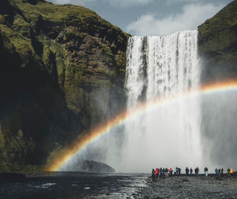Landscape View of a Rainbow in Skógafoss in Iceland | Golden Circle vs South Coast | Iceland with a View