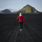 Picture of Jeannie Walking Towards the Road to the Highlands | Best Iceland Travel Guide | Iceland with a View